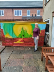 Help at Home Coordinator Alison with her finished garden mural